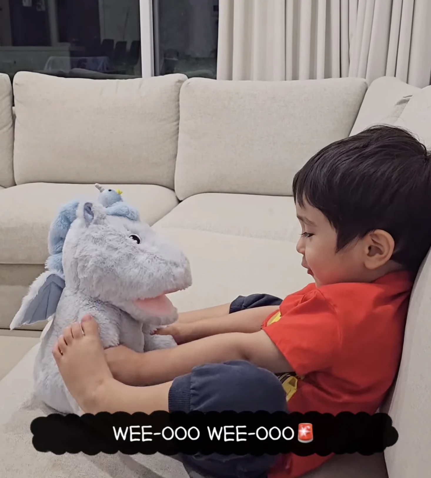 A child playing with Cati